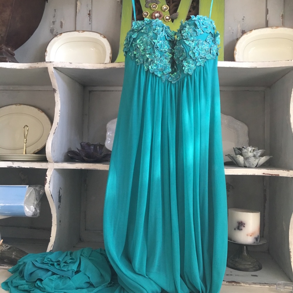 Jovani mermaid strapless teal gown